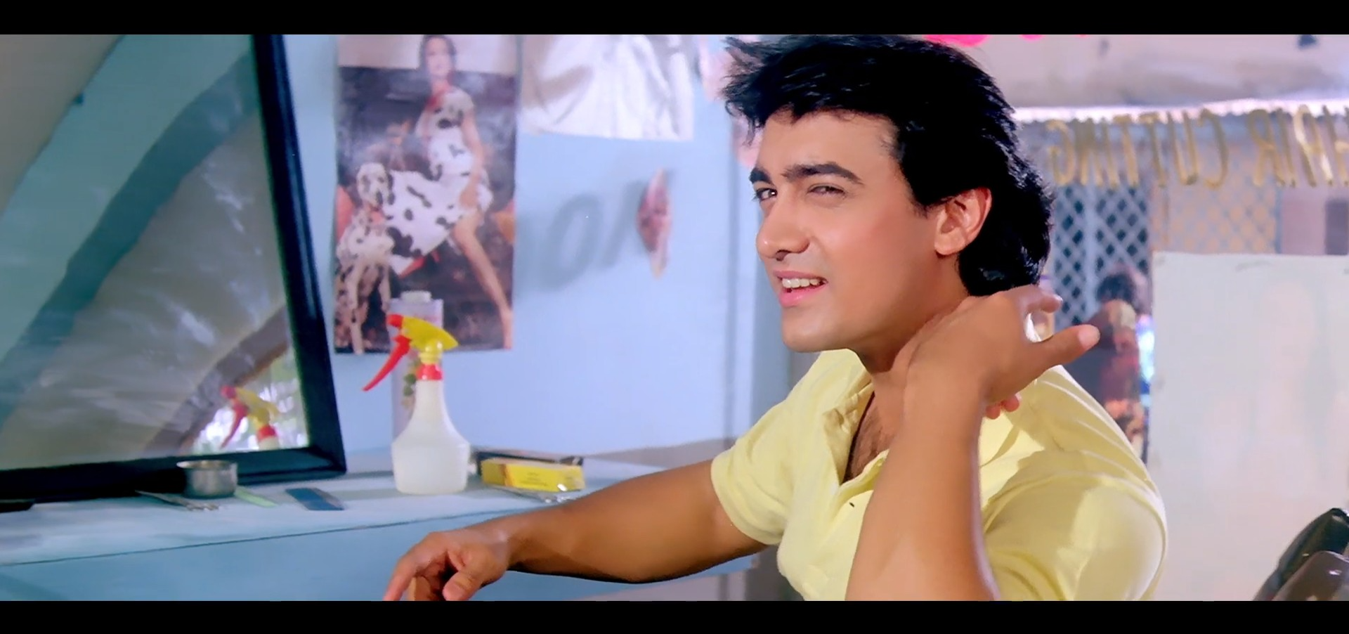 Aamir Khan stroking his hair