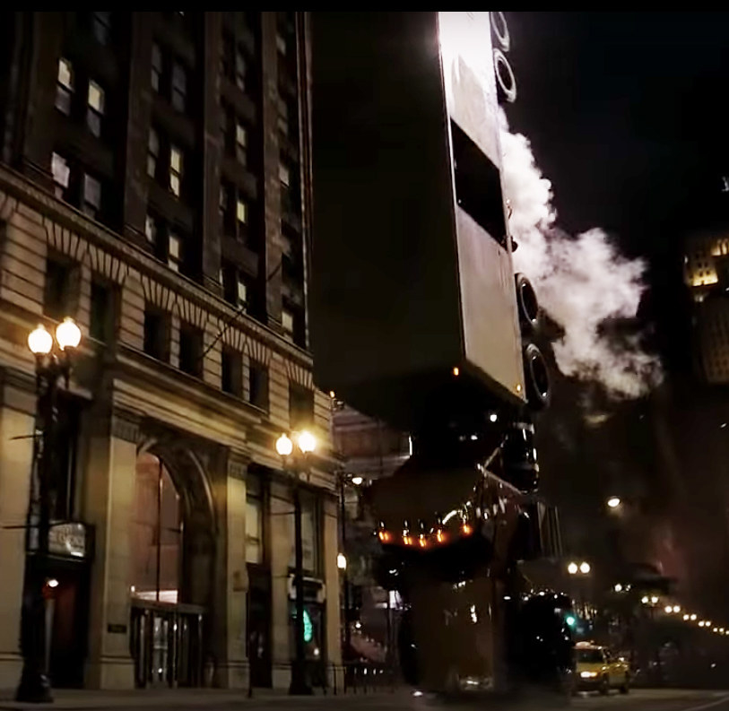 the Joker's semi flips over in the middle of downtown Chicago
