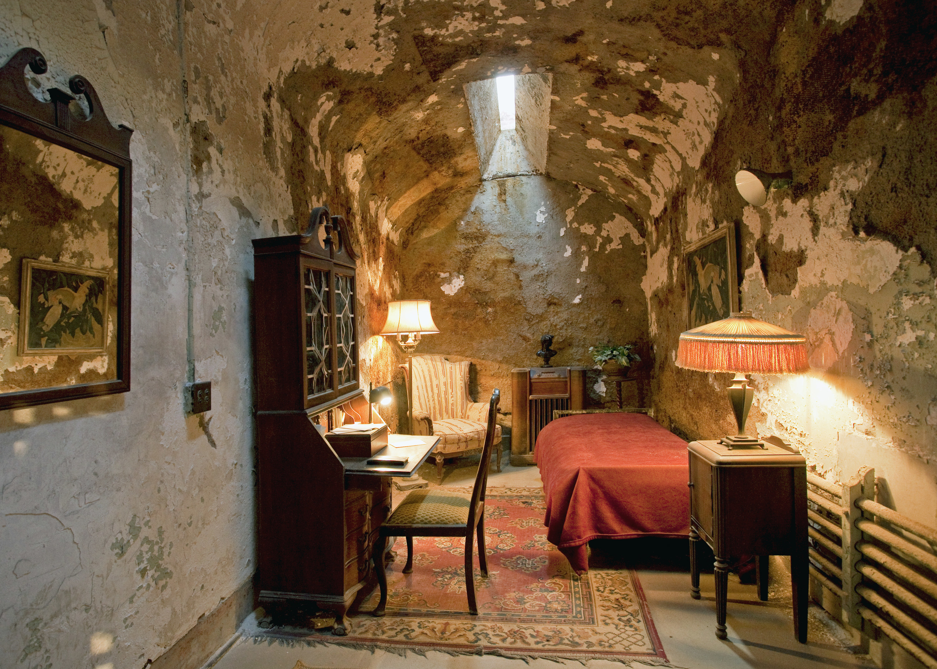 Al Capone&#x27;s concrete cell with small bed and desk