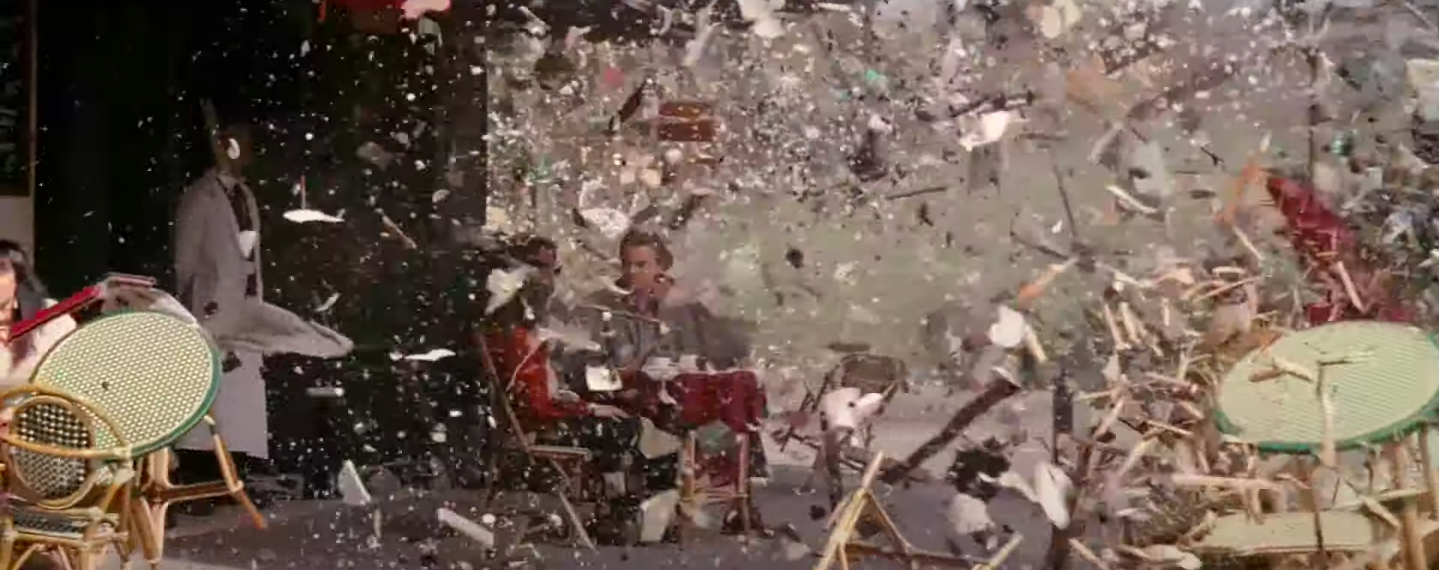the debris flies across the café at Ariadne's command