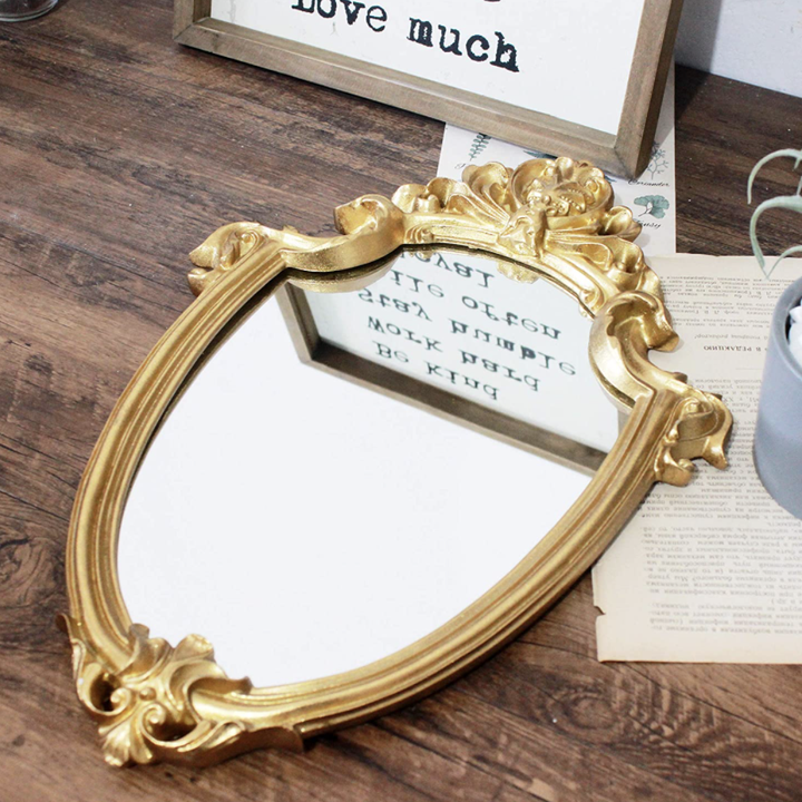 mirror laying on table