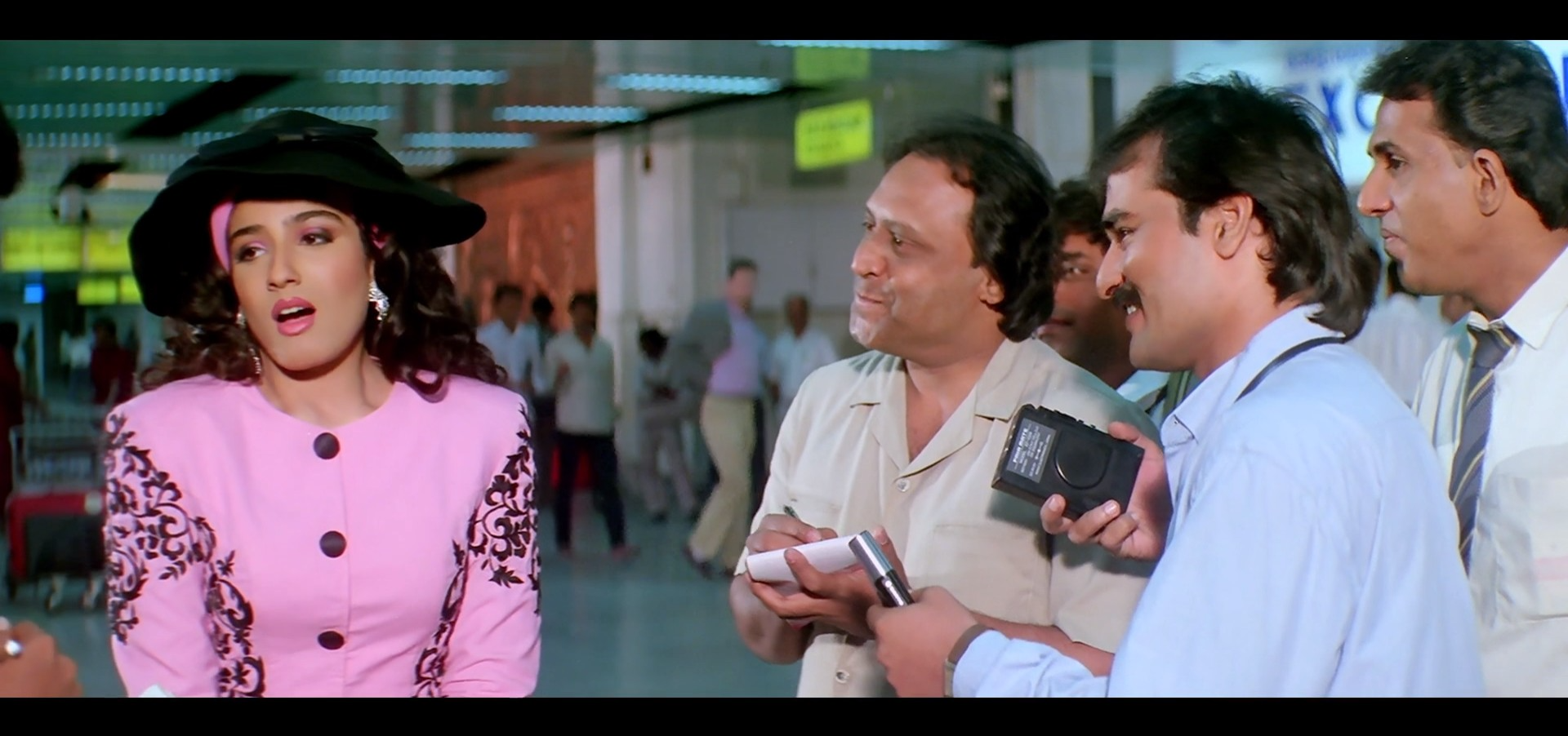 Raveena Tandon talking to people