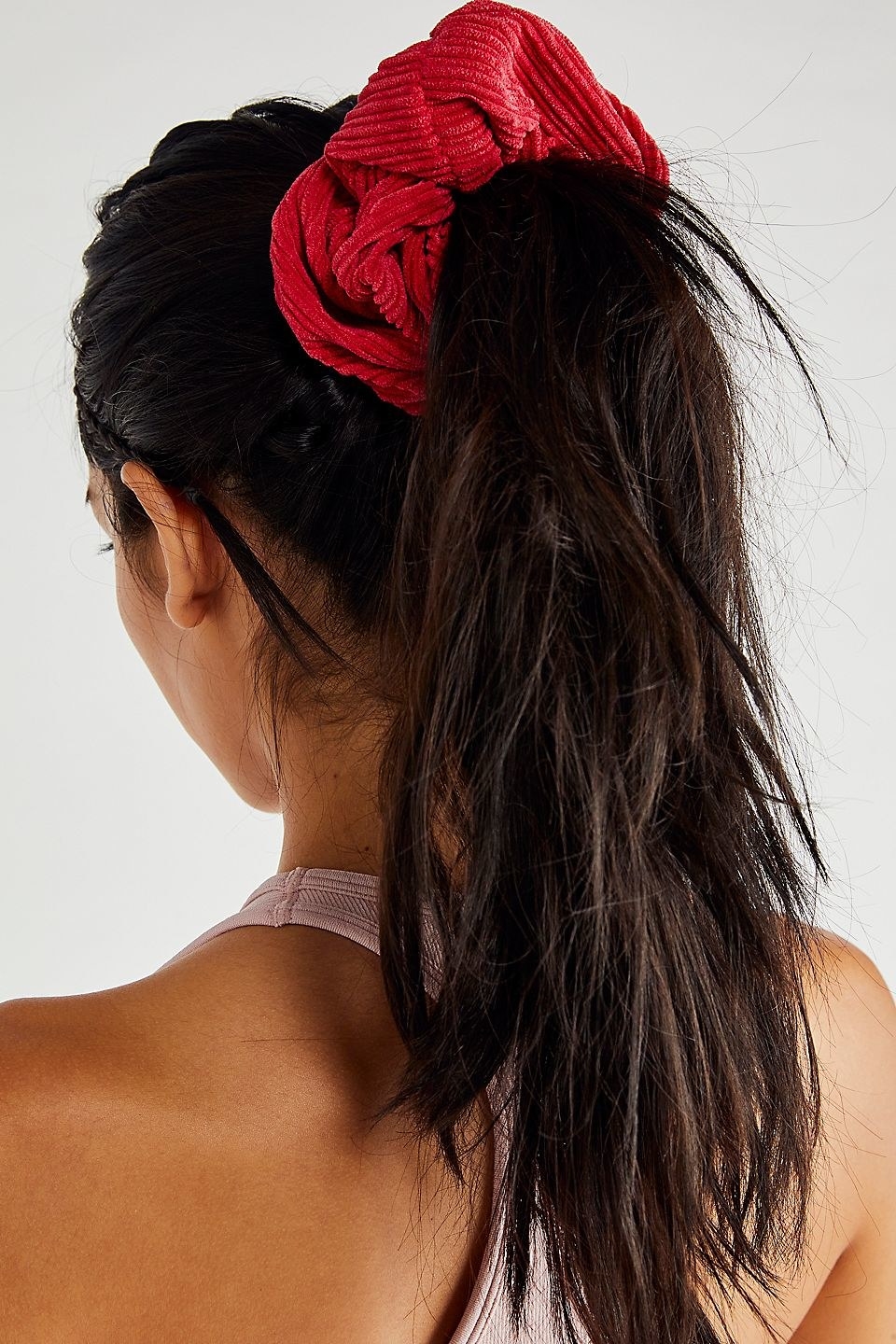 A model in the red scrunchie