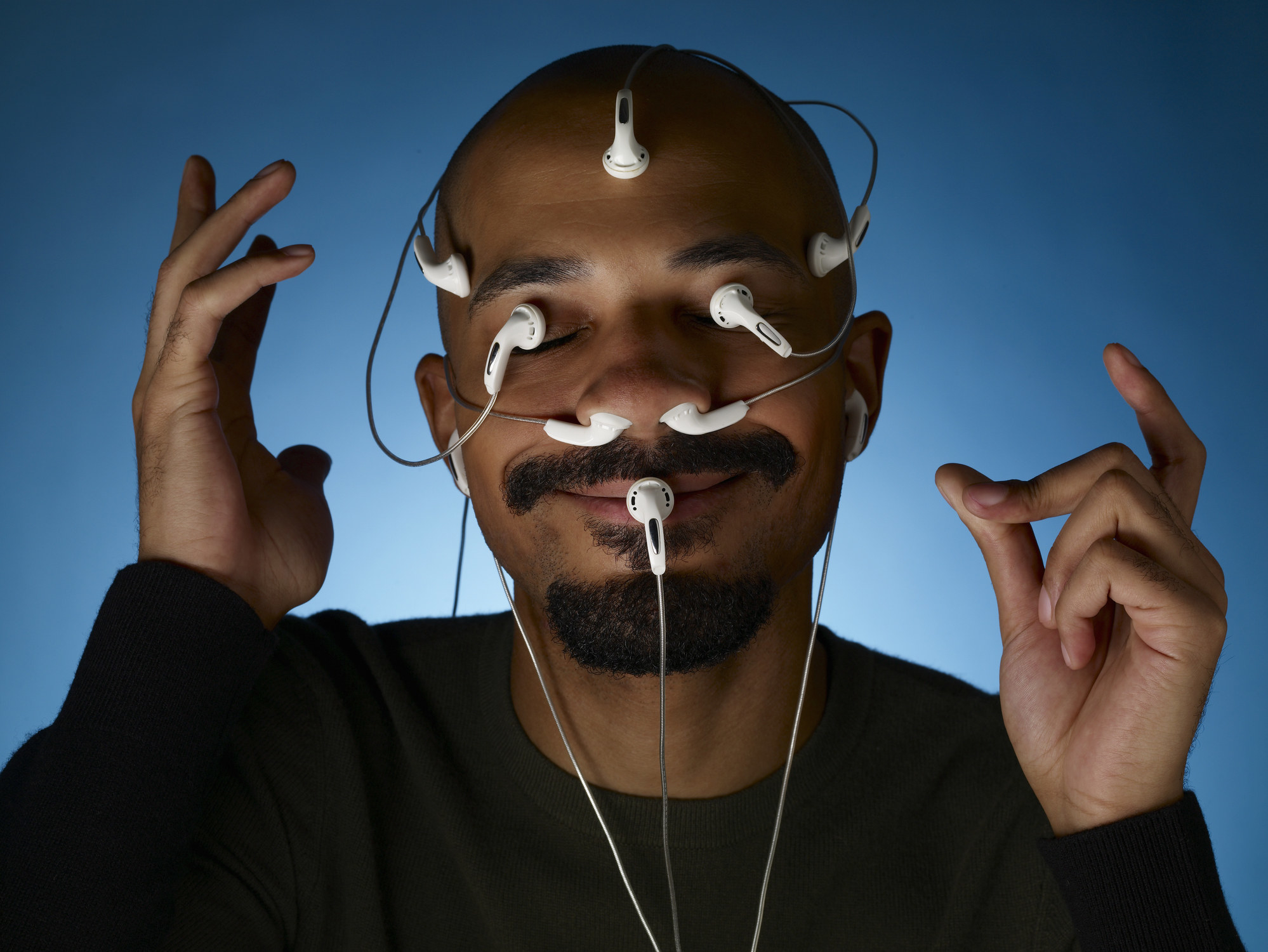 man with headphones all over his face