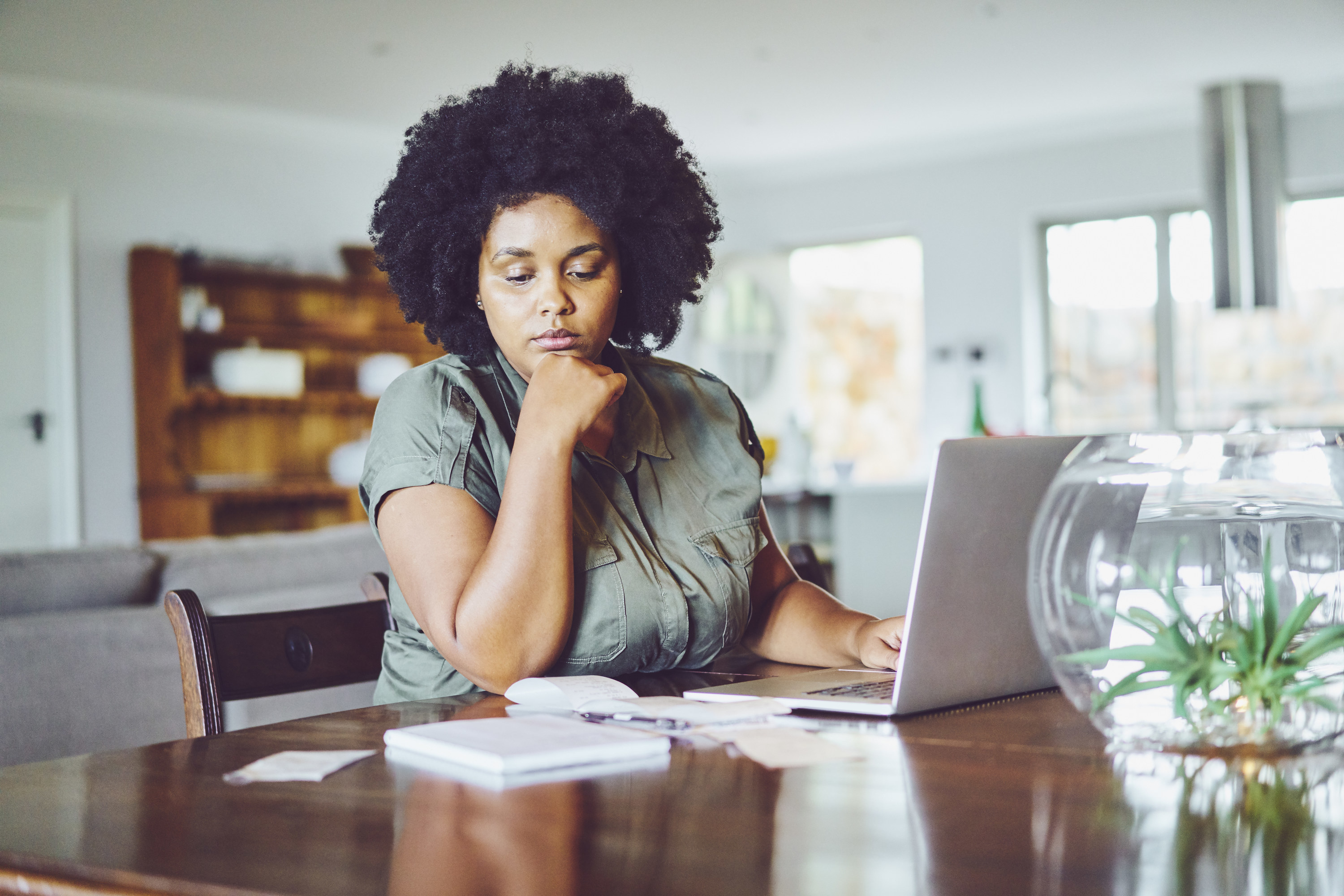 Woman looking at her bills