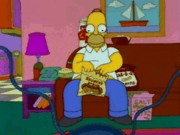 Homer eating lots of snacks
