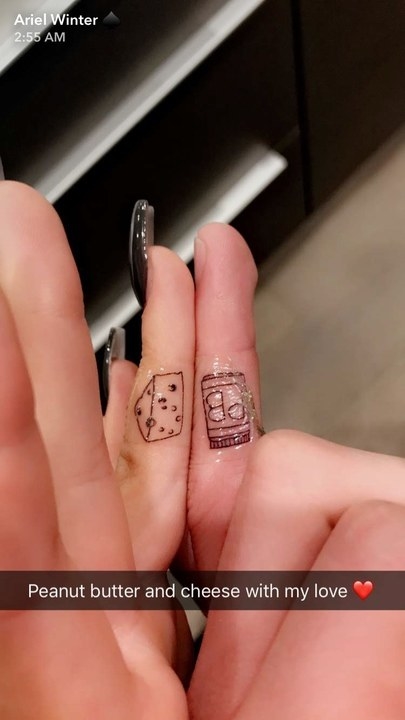 Peanut butter and cheese finger tattoos on Ariel&#x27;s snapchat