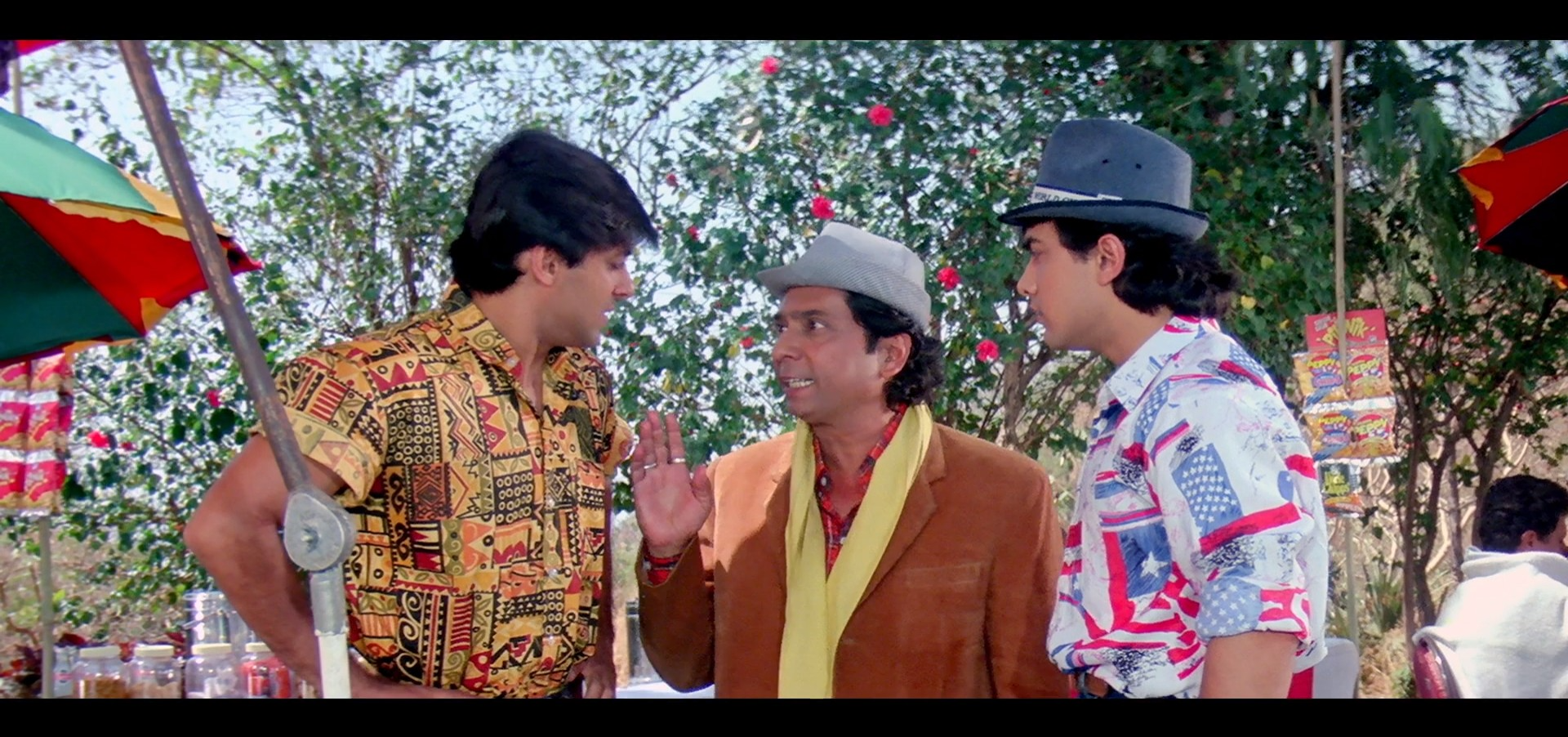 Prem and Amar talking to another person with