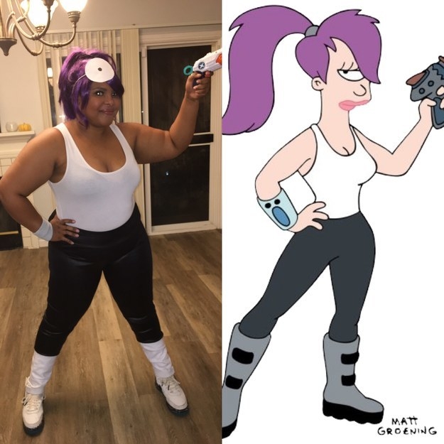 Someone dressed as Leela with a giant fake eye on their forehead