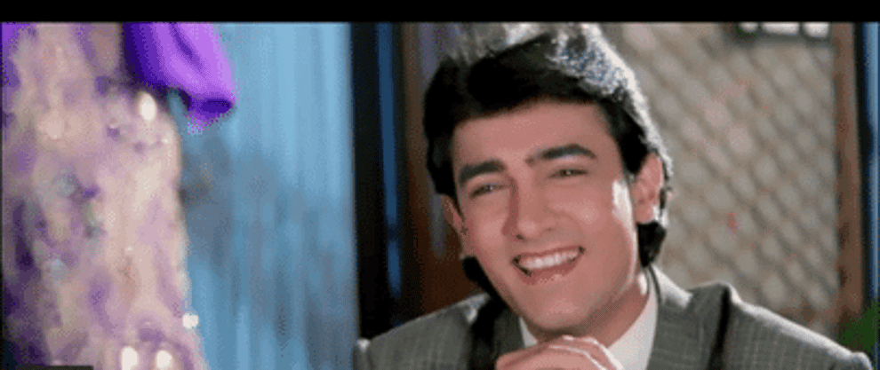 GIF showing Amar&#x27;s face change from happy to surprised