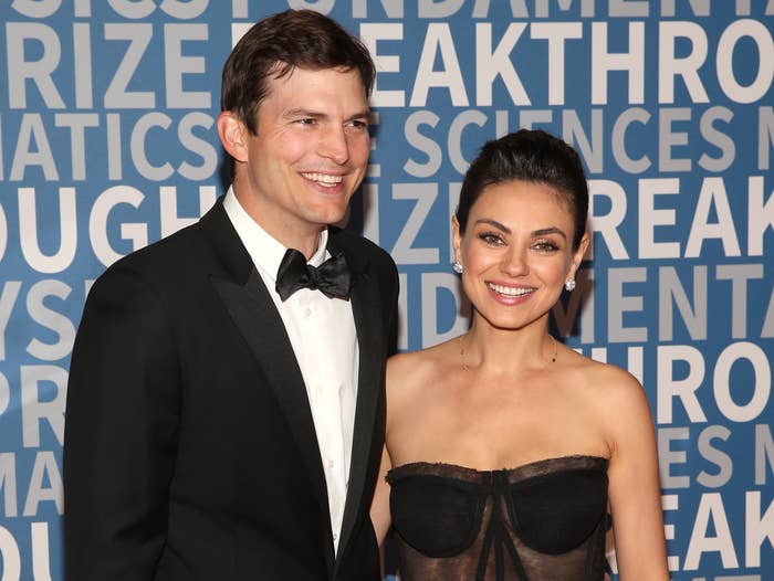 Ashton and Mila attend a red carpet event together