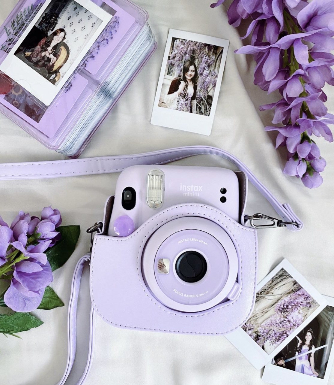 a purple instax mini polaroid camera