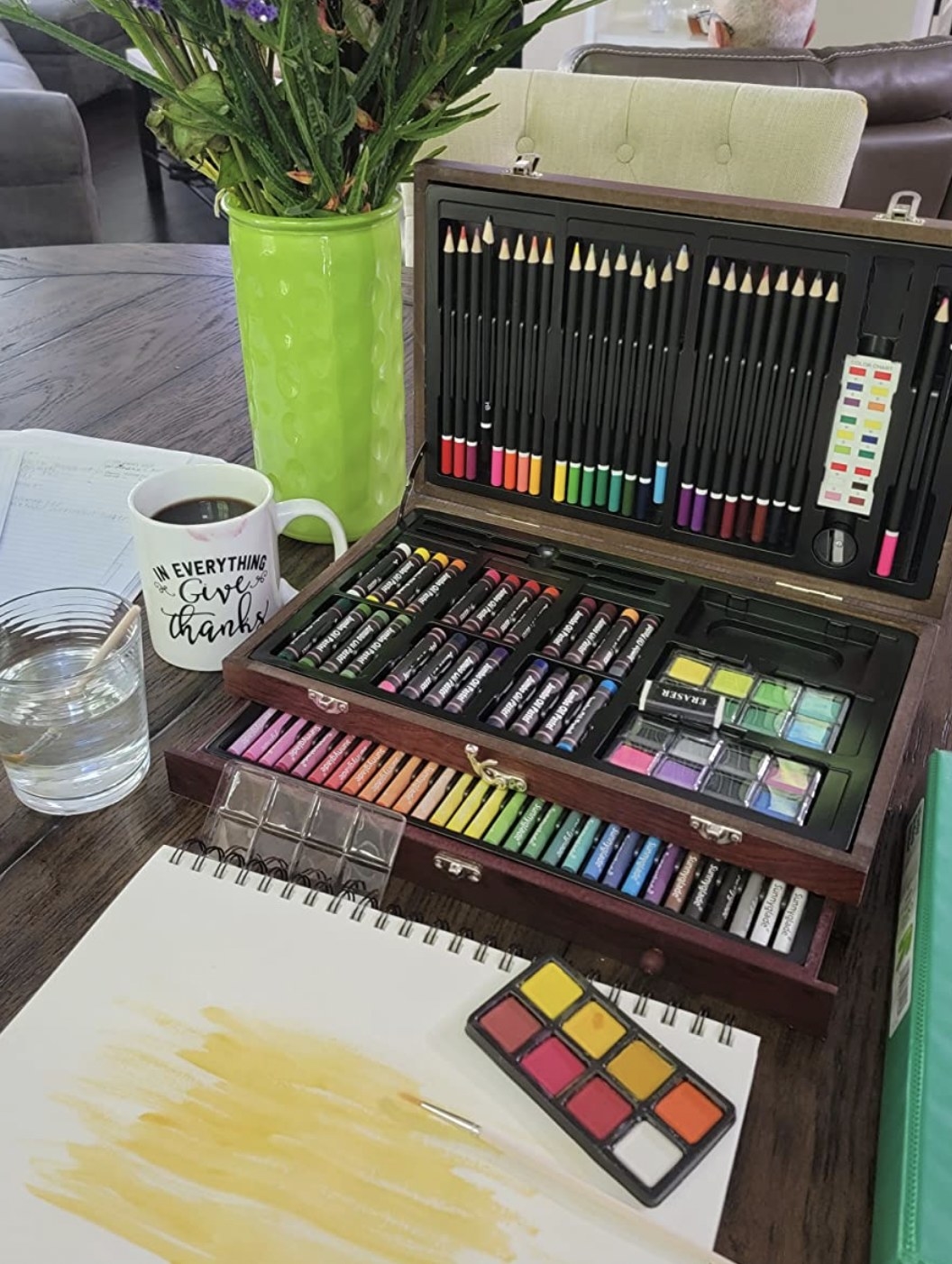 an art set with crayons, colored pencils, pastels, watercolors and more