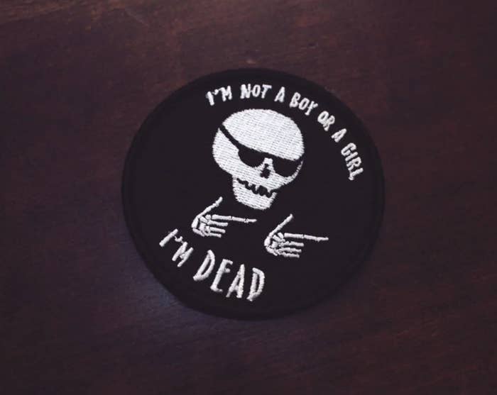 Skeleton doing finger guns and saying "I'm not a boy or a girl, I'm dead."