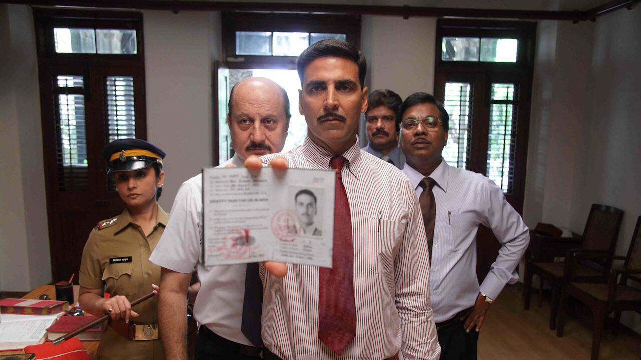 A still of Akshay Kumar, Anupam Kher, and Divya Dutta, along with other actors, from the movie