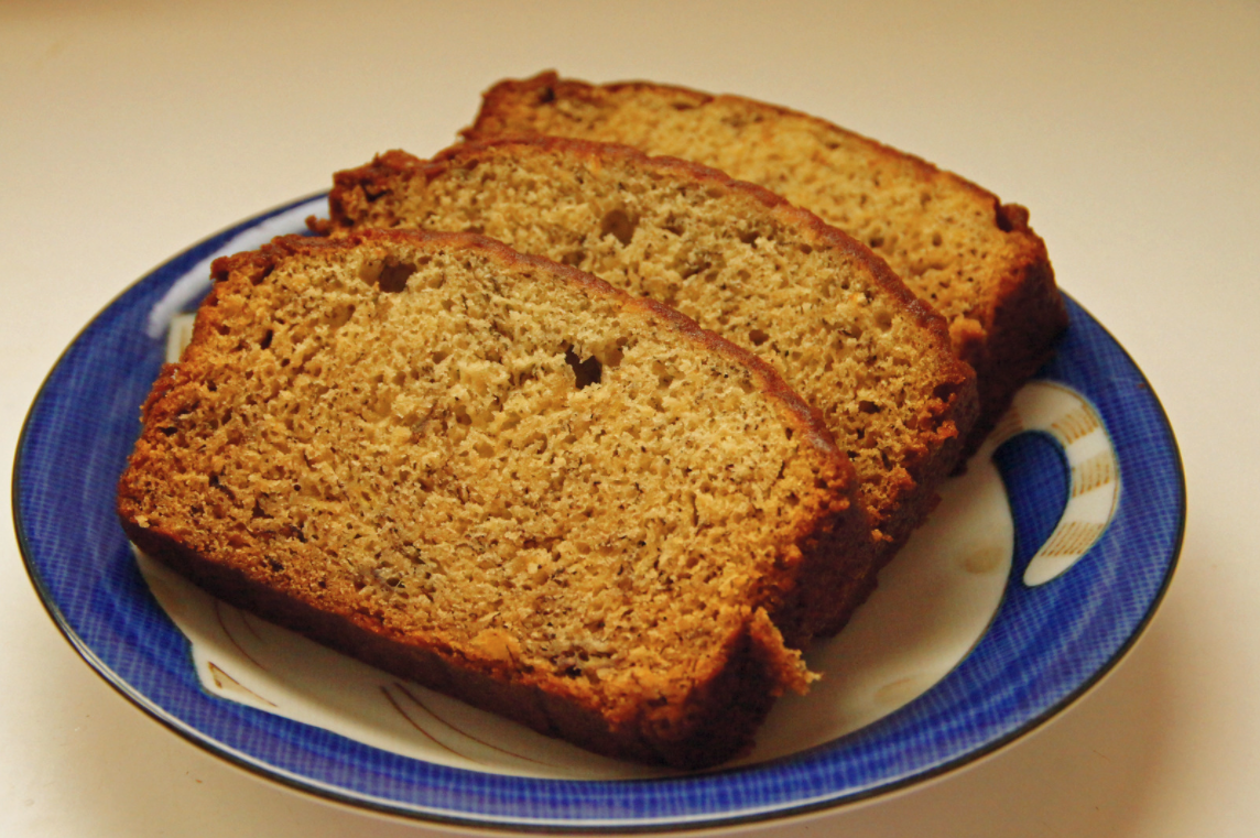 Slices of a banana bread sitting on a plate