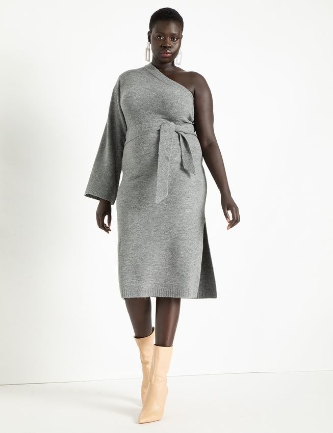 A model in the grey knit dress