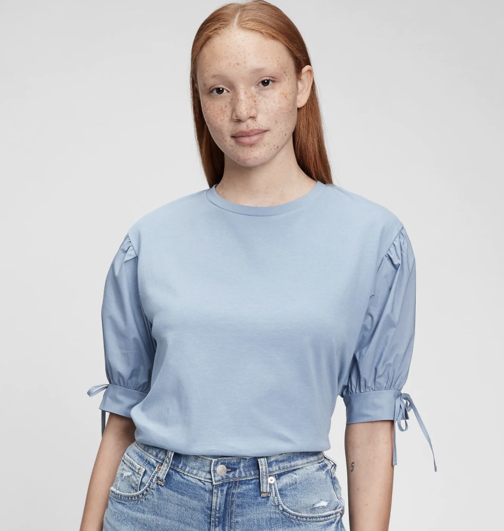 model wearing the shirt in blue