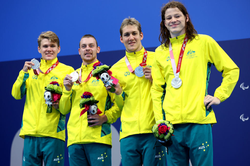 Silver medalist Timothy Hodge, Timothy Disken, William Martin and Ben Popham of Team Australia celebrate during the medal ceremony for the Men&#x27;s 4x100m Medley Relay