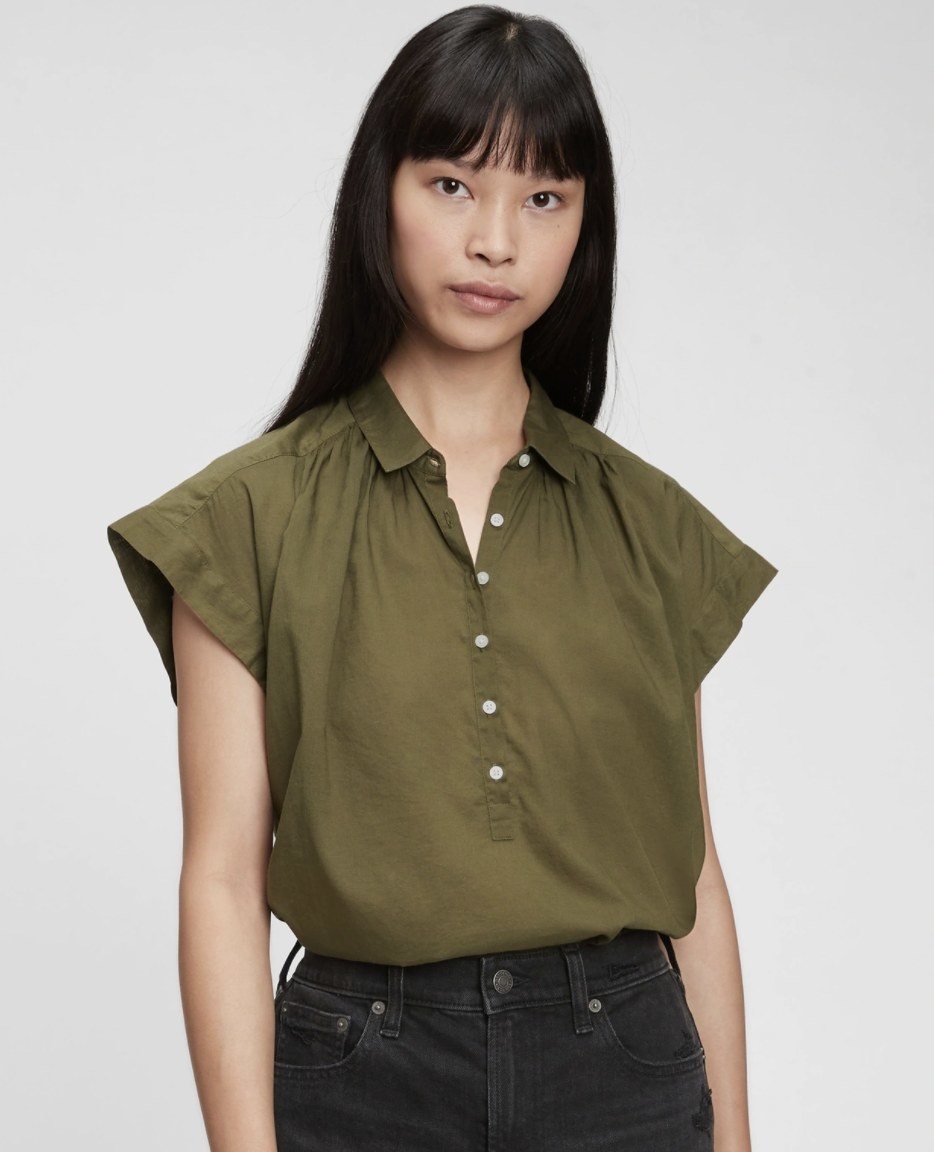 model wearing the top in green