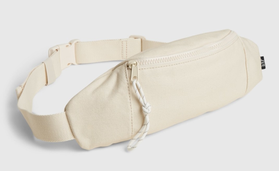 an ivory canvas belt bag