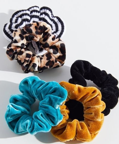 The blue, yellow, black, striped, and leopard-print scrunchies