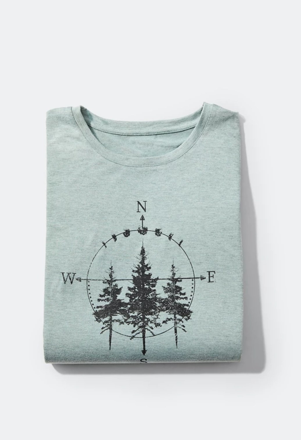 the min shirt with three trees and a compass over them