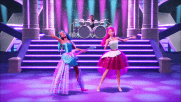 barbie and another barbie character are on a stage, singing and dancing
