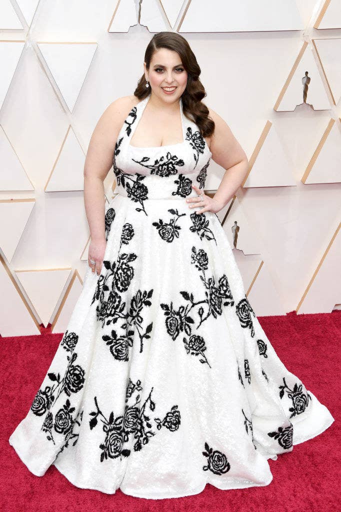 Beanie at the Academy Awards in a sequined halter dress with floral embellishments