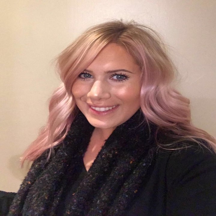 Reviewer with pink hair from using product