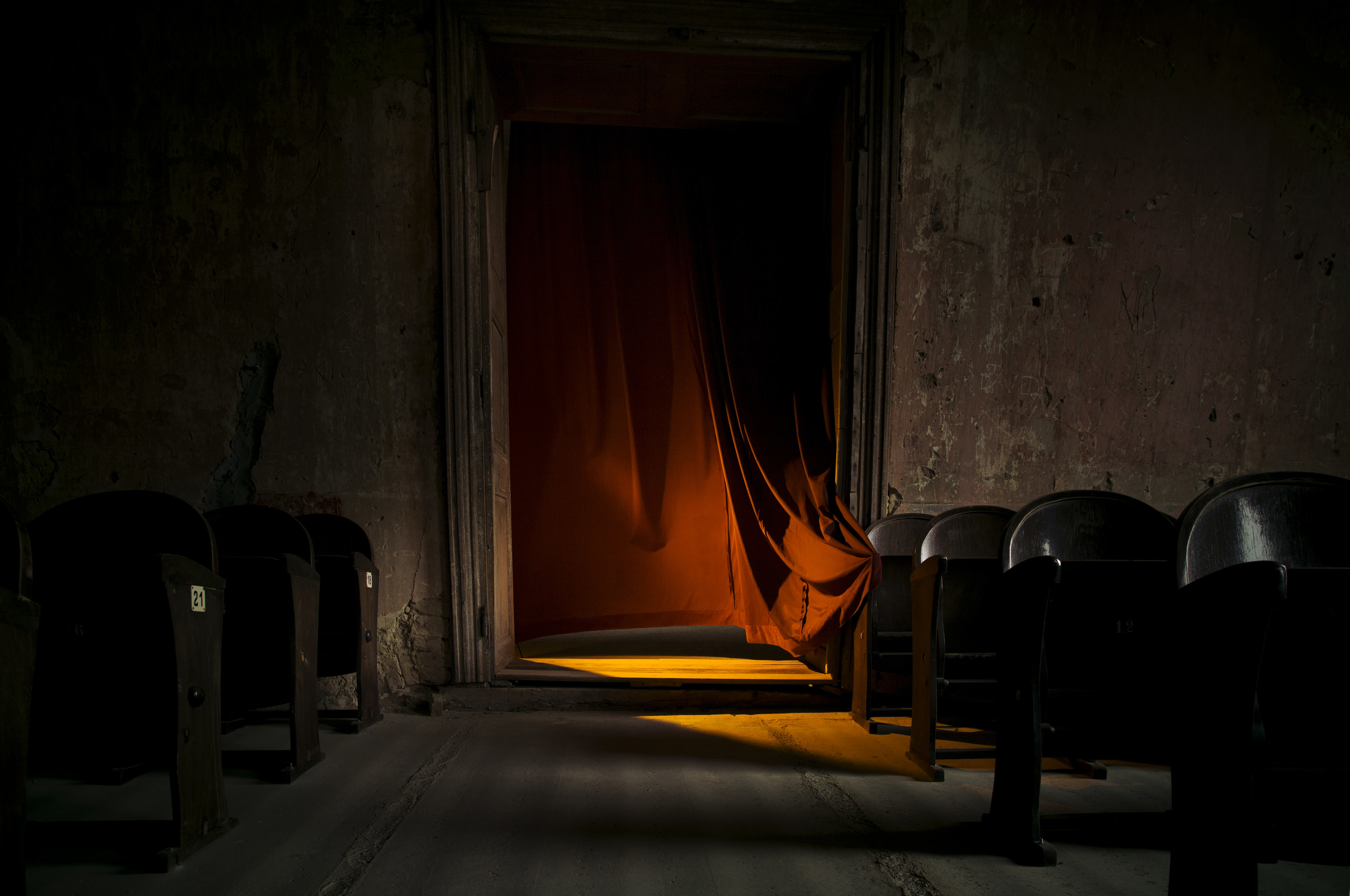 an empty dark abandoned theatre