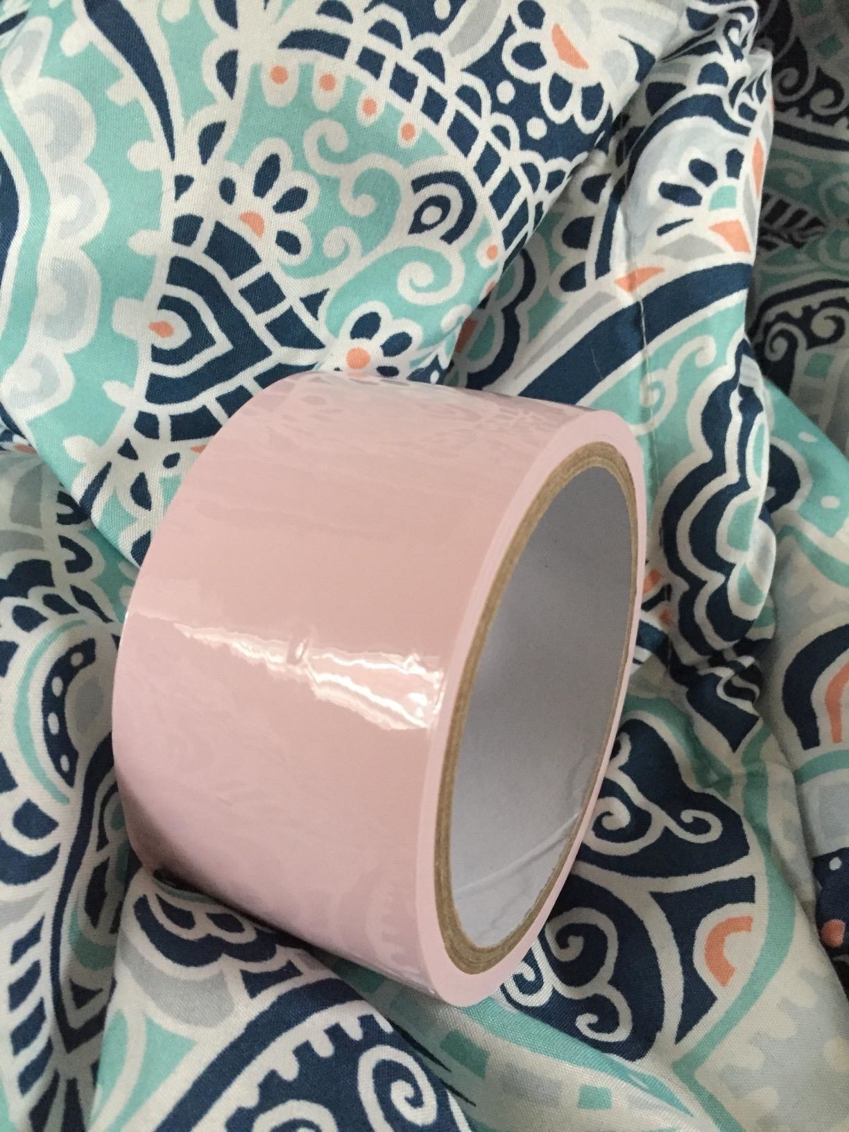 Roll of light pink tape