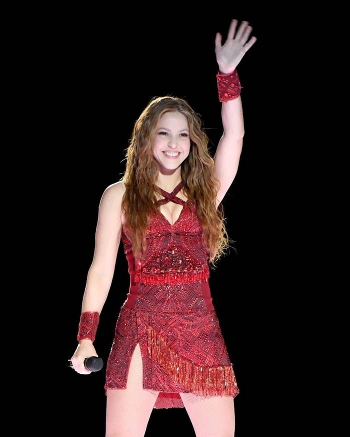 Shakira waving to the crowd after performing at the 2020 Superbowl