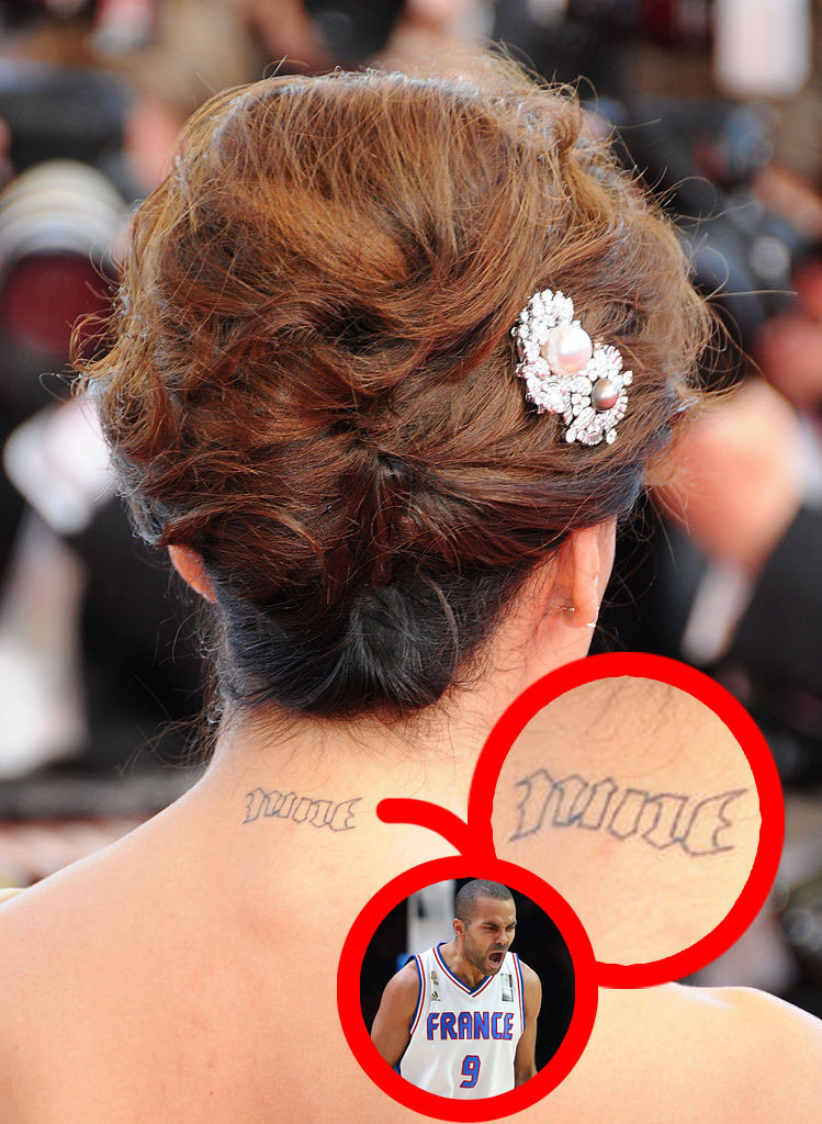 Eva Longoria&#x27;s neck with the word, &quot;Nine&quot; tattooed on it