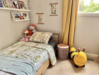the stool used as a nightstand in a child's bedroom