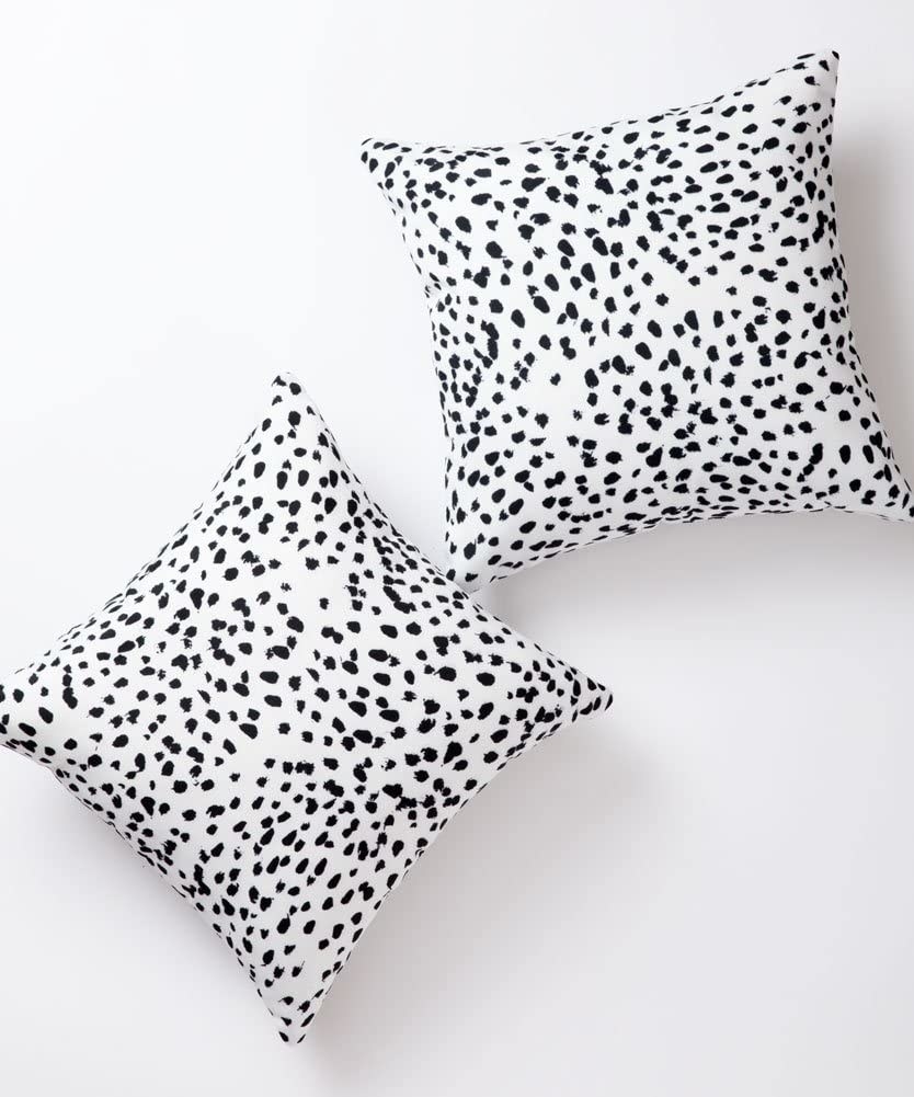 two pillows with the dalmation covers on them