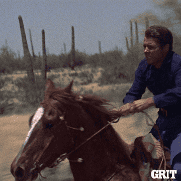 a GIF of a man riding a horse