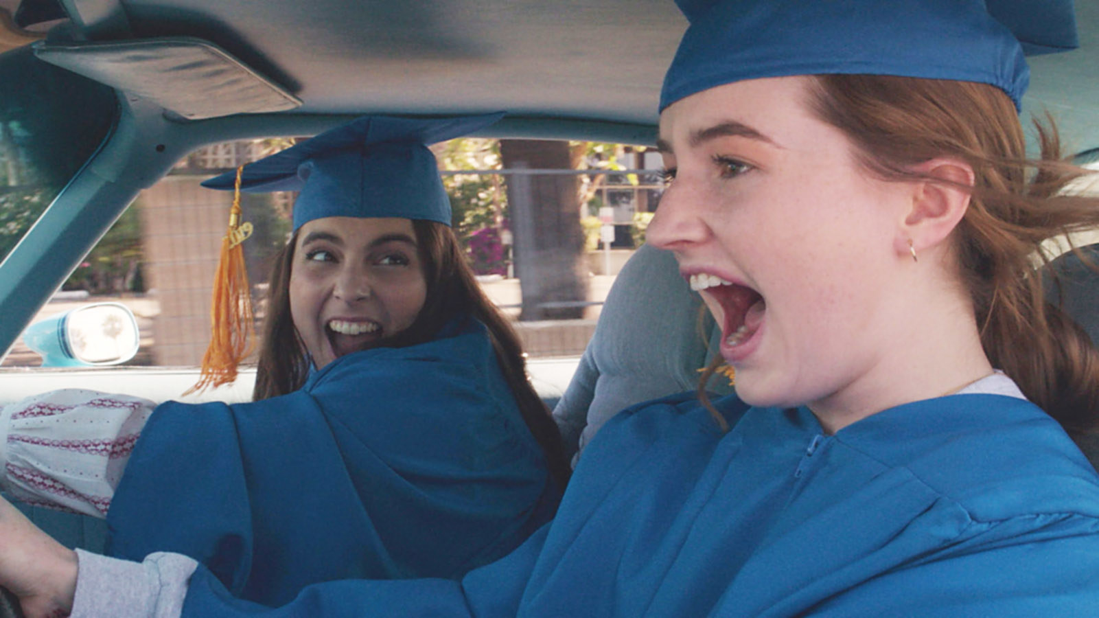 Beanie&#x27;s character yelling in a car with a friend on their graduation day