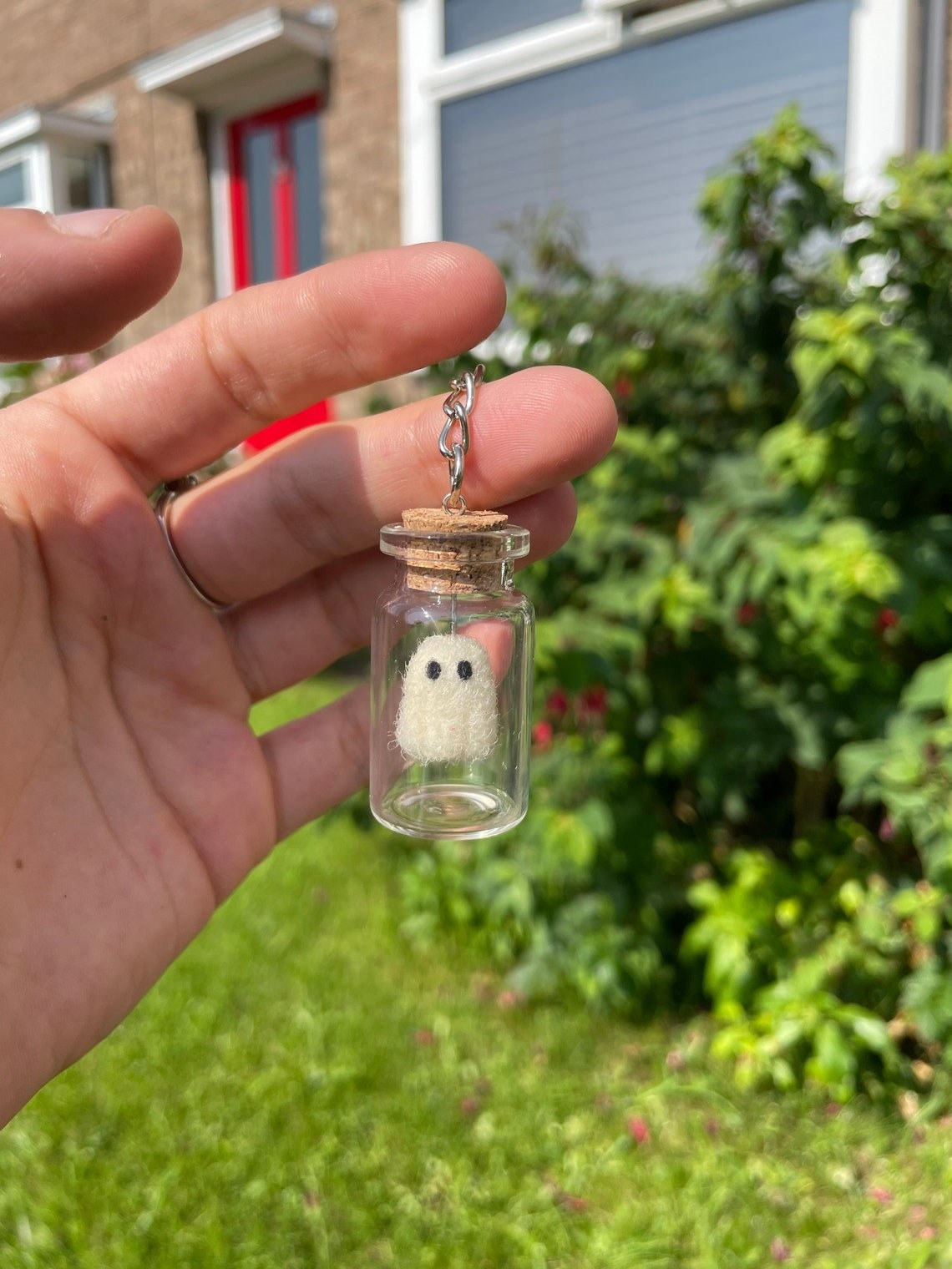 tiny ghost in corked jar