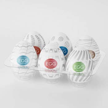 Egg carton with six egg-shaped strokers