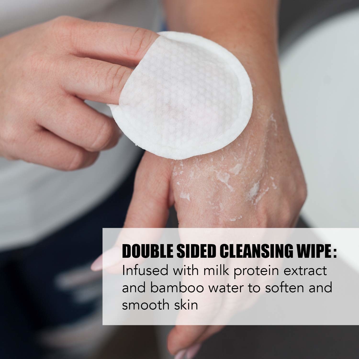 person wiping pad on back of hand
