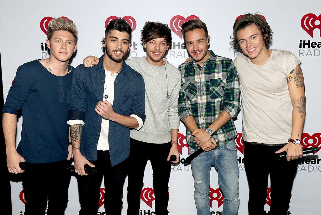 Red carpet shot of One Direction at iHeartRadio, the order is as follows: Niall, Zayn, Louis, Liam, and Harry