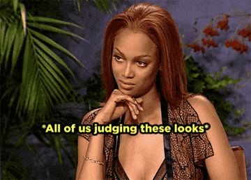 Tyra looking at someone with the caption &#x27;All of us judging these looks&#x27;