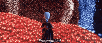 Megamind is saying &quot;Presentation!&quot;.