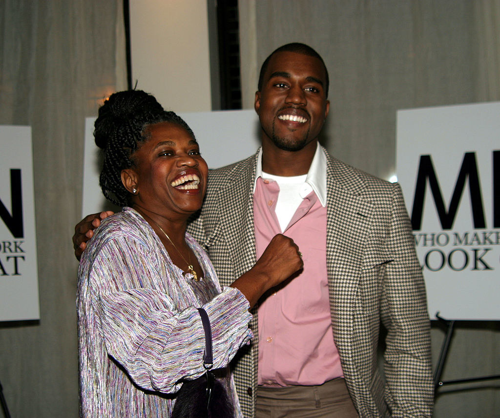 Kanye with his arm over his mother&#x27;s shoulder