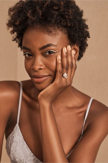 model wearing the ring on their ring finger 