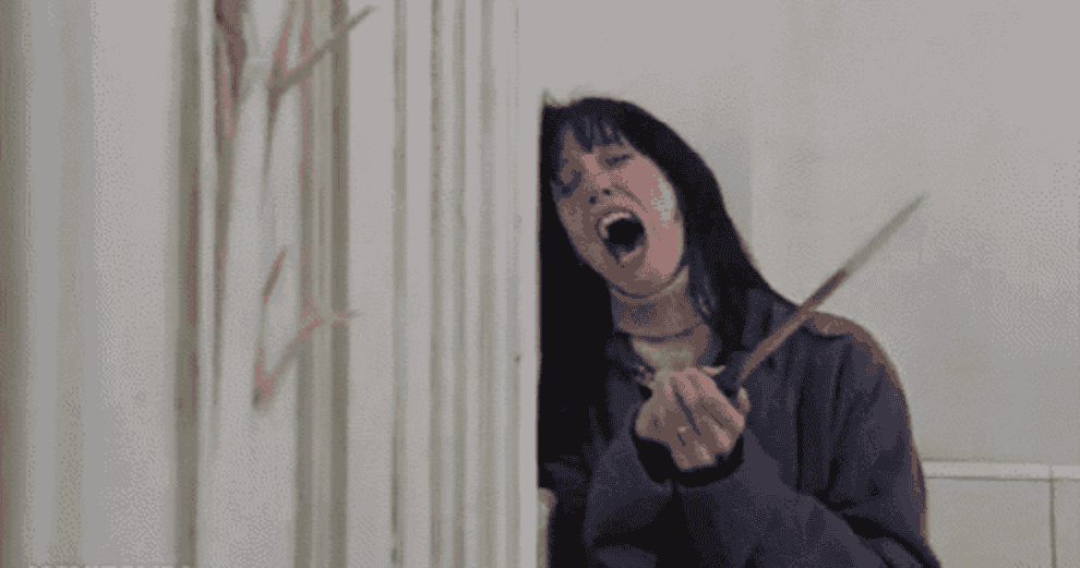 Woman screams as an ax breaks through a door