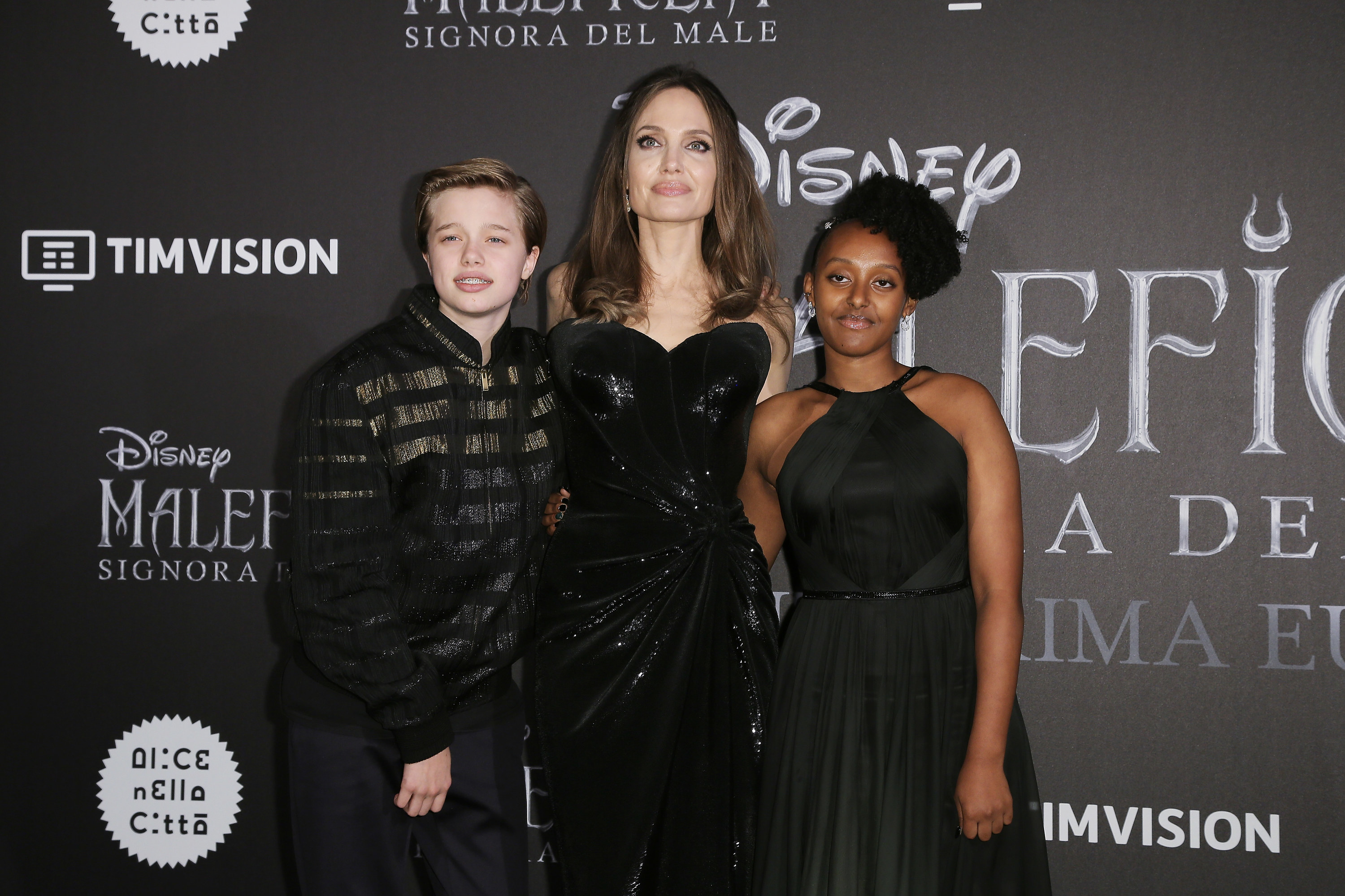 Angelina on the red carpet with two of her children