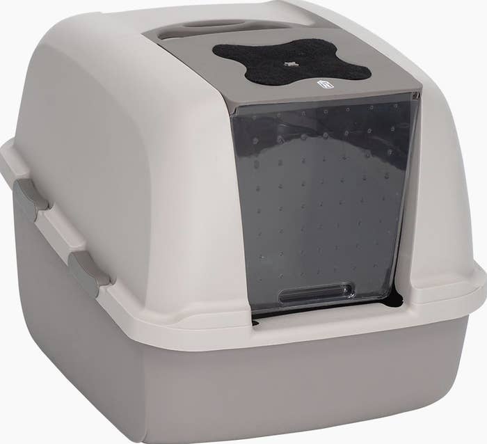 The box has a dark grey bottom and a light grey top with a black filter and clear door