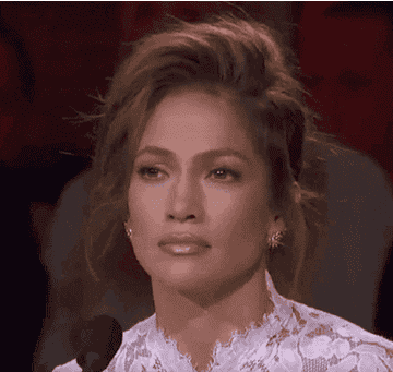 Jennifer Lopez shaking her head